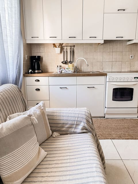 Apartment, 2 Bedrooms | Private kitchen | Full-size fridge, oven, stovetop, coffee/tea maker
