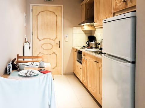 Grand Studio, 1 Double Bed with Sofa bed, Non Smoking, Balcony (Triple) | Private kitchen | Full-size fridge, oven, stovetop, coffee/tea maker