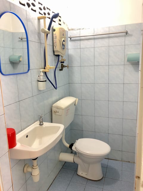 Standard Room, Private Bathroom (With Air Con) | Bathroom | Shower, hair dryer, bidet, towels