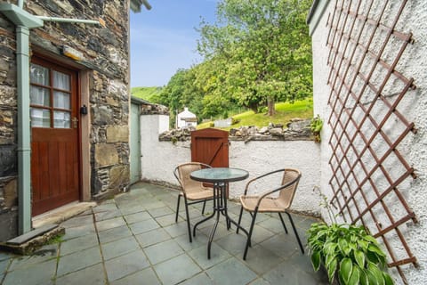 At the rear of the property is a lovely patio and seating area with access to the kitchen