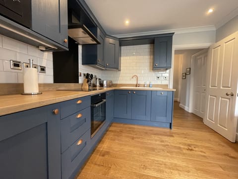 There's plenty of space in the open plan kitchen and dining area for everyone to help with dinner