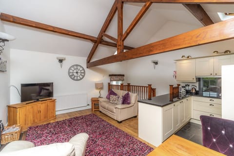 You can enjoy the lovely garden views while you relax on the sofa