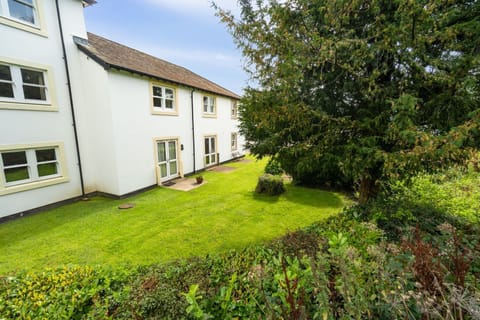 The property is set out over 2 floors and has double doors from the living area to the shared garden