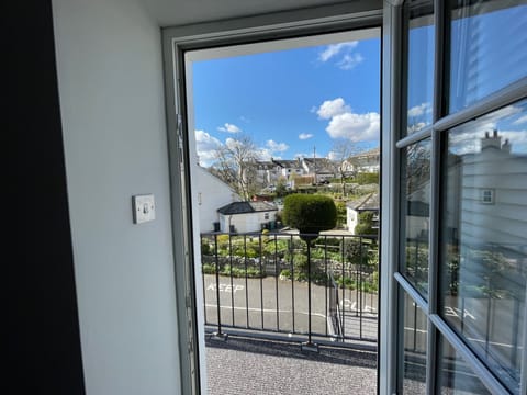 A beautiful sunny outlook from the front, southwest facing entrance