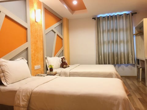 Deluxe Triple Room | Blackout drapes, soundproofing, free WiFi, bed sheets