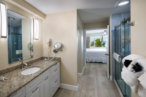 Sand Castle Penthouse | Bathroom | Designer toiletries, hair dryer, towels, soap