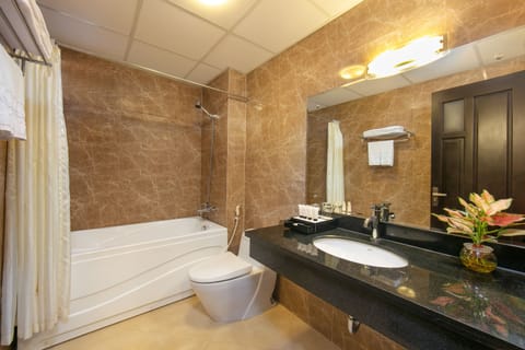 Suite, City View | Bathroom | Shower, free toiletries, hair dryer, slippers