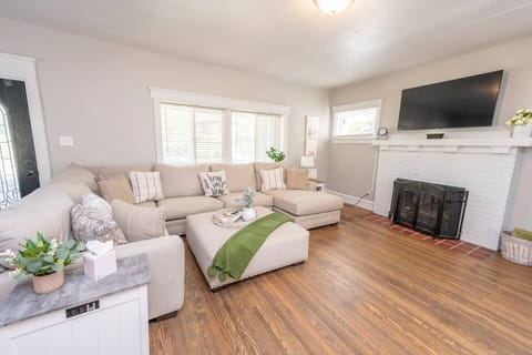 Relax in the spacious, ultra-comfortable living room. Note the built-in charging station at lower left.