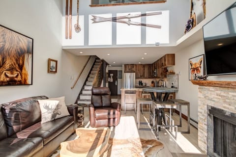 Open concept living space with 1/2 bath. 2 bedrooms and 2 full baths upstairs.