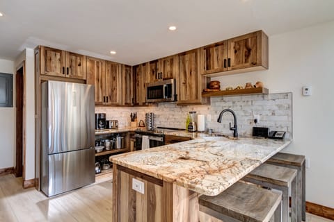 Fully stocked kitchen including spices, olive oil, tea and coffee bar