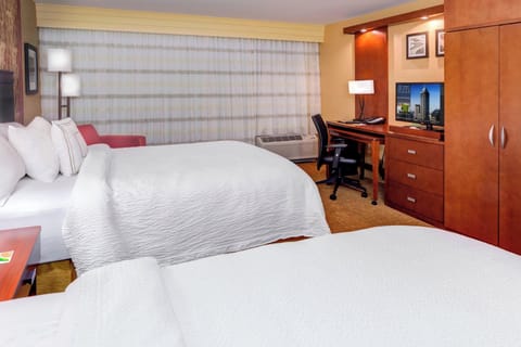 Premium bedding, memory foam beds, in-room safe, desk