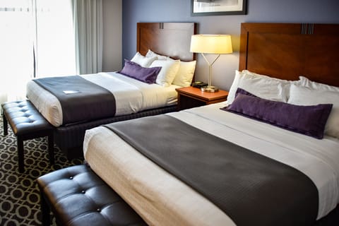 Suite, 2 Queen Beds | Hypo-allergenic bedding, desk, iron/ironing board, free WiFi