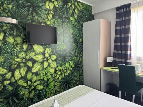 Single Room | Down comforters, minibar, in-room safe, desk