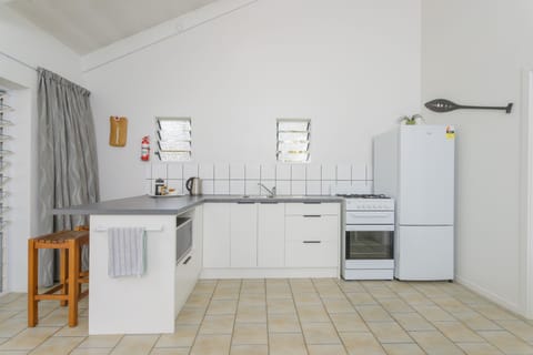 Apartment, 3 Bedrooms | Private kitchen | Full-size fridge, microwave, stovetop, electric kettle