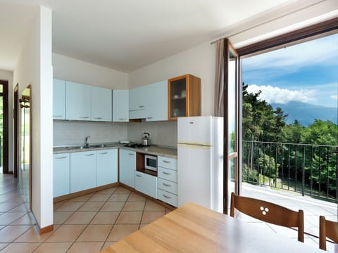 Superior Apartment, 2 Bedrooms, Lake View | Private kitchen | Full-size fridge, coffee/tea maker, cookware/dishes/utensils