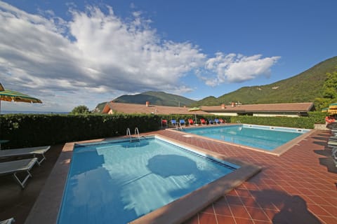 Seasonal outdoor pool, pool umbrellas, sun loungers