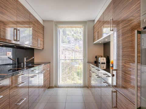 Property, Cabinetry, Wood, Building, Interior Design, Countertop, Flooring, Floor, Kitchen