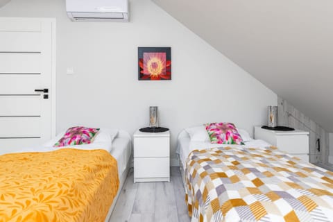 Comfortable single beds in the bedroom. 