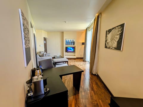 Suite, 1 Bedroom, Ocean View | Living room | Flat-screen TV