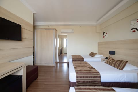 Superior Room, 3 Twin Beds | Minibar, in-room safe, laptop workspace, blackout drapes