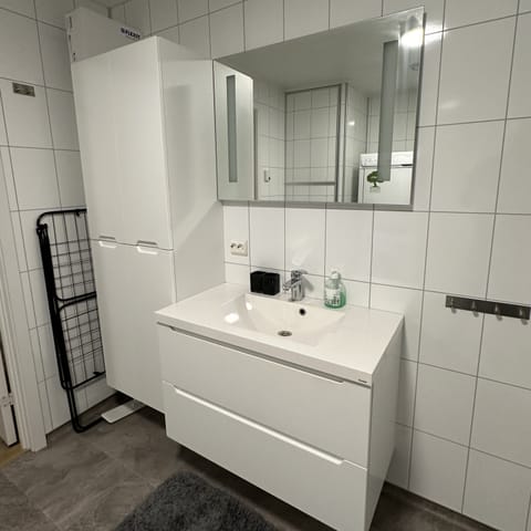 Grand Apartment | Bathroom | Shower, hair dryer, bathrobes, slippers