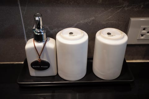 Shower, free toiletries, hair dryer, slippers