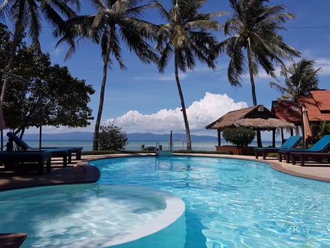 Outdoor pool, pool umbrellas, sun loungers