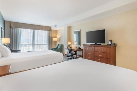 Desk, laptop workspace, blackout drapes, iron/ironing board