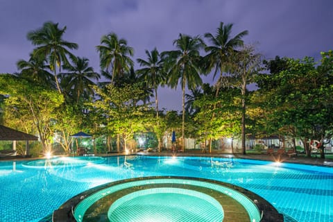 Outdoor pool, a waterfall pool, free cabanas, pool umbrellas