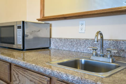 Room, 2 Queen Beds | Private kitchen | Fridge, microwave, cookware/dishes/utensils, freezer