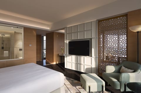 Premium bedding, down comforters, pillowtop beds, minibar