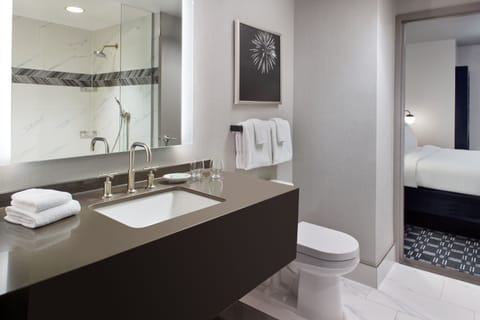 Suite, 1 Bedroom, Non Smoking | Bathroom | Combined shower/tub, free toiletries, hair dryer, towels