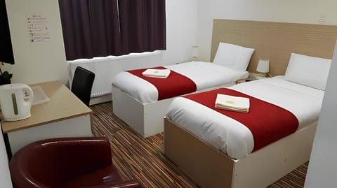 Standard Twin Room, 2 Twin Beds | Individually furnished, desk, laptop workspace, free WiFi