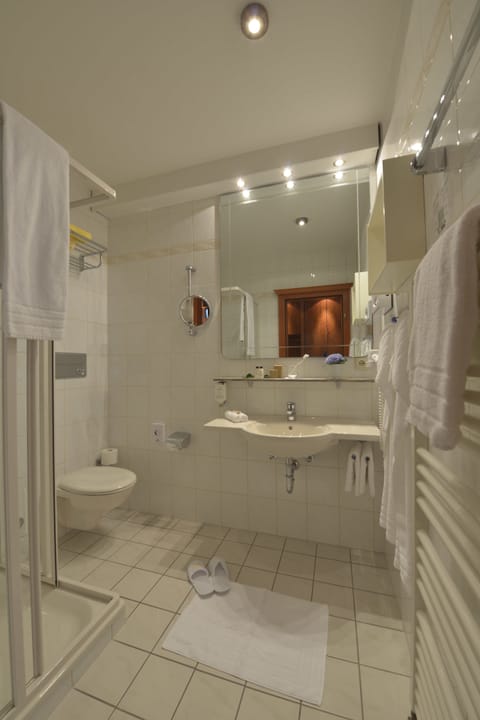 Classic Single Room | Bathroom | Shower, hair dryer, bathrobes, slippers