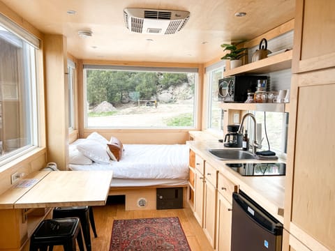 Oxford Tiny Home | Individually decorated, individually furnished, blackout drapes