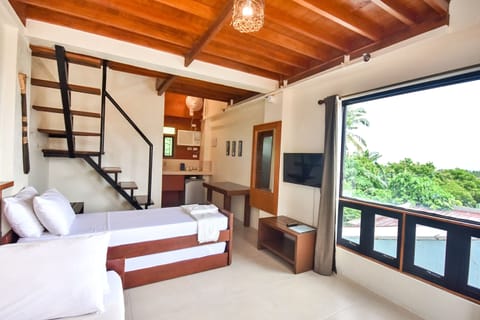 Family Room, Ocean View (Stair Access only) | In-room safe, free WiFi, bed sheets