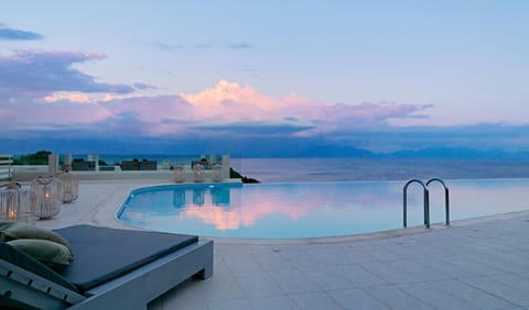 Indoor pool, outdoor pool, pool umbrellas, sun loungers