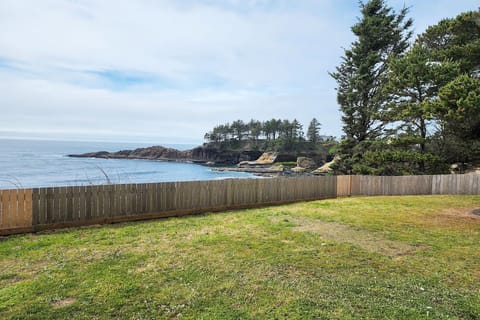 Large grassy yard for outdoor family fun.