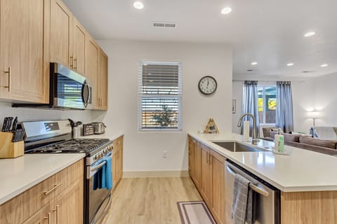 Large, fully stocked kitchen for all of your cooking needs 