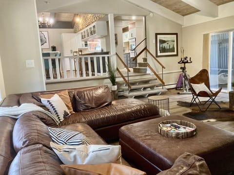 Large living room looking into the kitchen and dining area of the main house