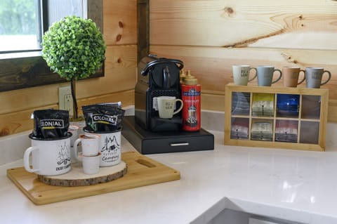Start your mornings right with a full coffee and tea bar — Keurig, Nespresso, and more included.