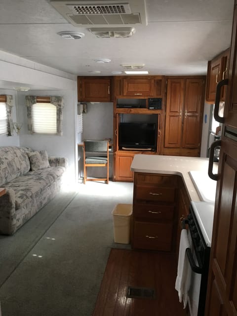 Nomad Camper, 1 Queen Bed, Non-Smoking, 2 Adults(Check-in before dark) | Living area | Flat-screen TV