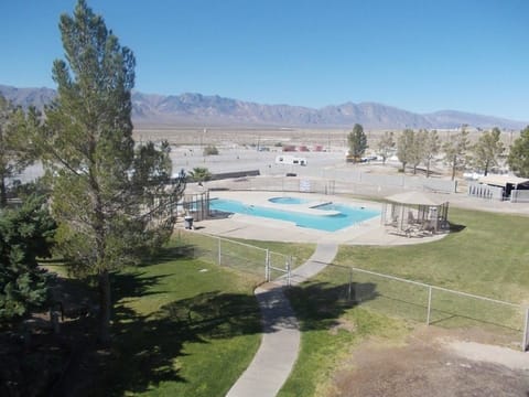 Seasonal outdoor pool, pool umbrellas, sun loungers