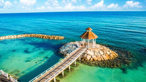 Private beach, white sand, sun loungers, beach umbrellas