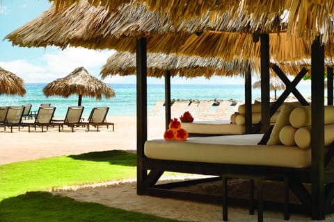 Private beach, white sand, sun loungers, beach umbrellas