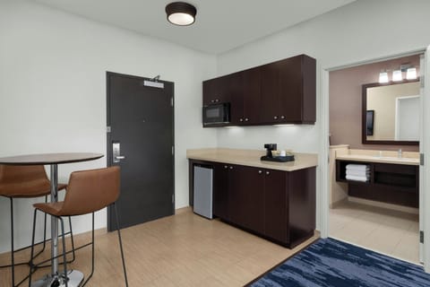 Desk, blackout drapes, iron/ironing board, free cribs/infant beds