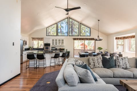 OPEN FLOOR PLAN, LIVING ROOM, DINING ROOM AND KITCHEN AREA ON MAIN FLOOR WITH ACCESS TO THE DECK