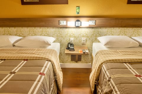 Standard Room, 2 Double Beds | Minibar, in-room safe, desk, soundproofing