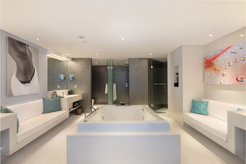 66 Penthouse, Ocean View | Bathroom | Separate tub and shower, rainfall showerhead, designer toiletries