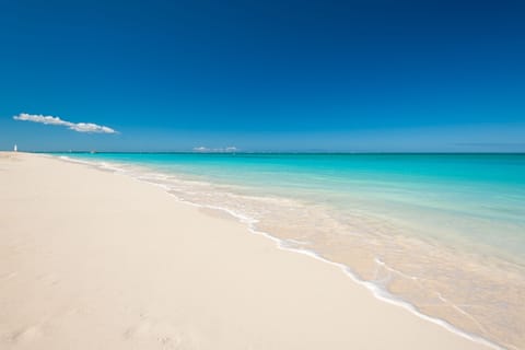 Beach nearby, white sand, sun loungers, beach umbrellas